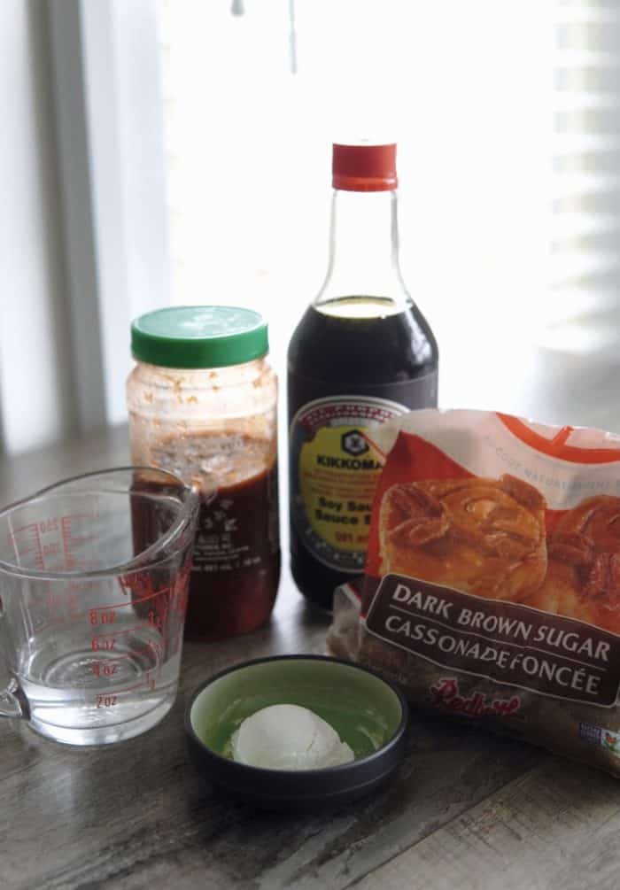 With just 4 ingredients, you can make your own teriyaki sauce. Ingredients needed: kikkoman soy sauce, brown sugar, sriracha, and corn starch.