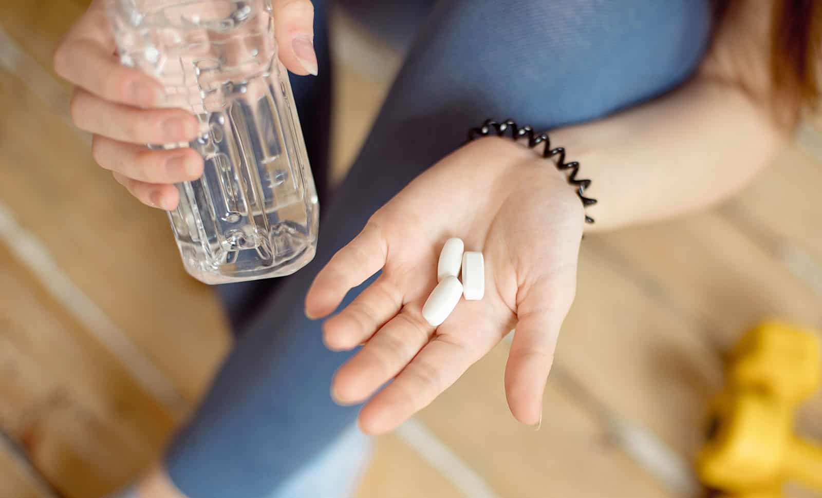 Calcium Supplements In Hand